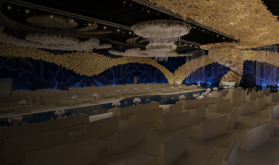 Orchids, mirrors and warm gold — luxury event atmosphere